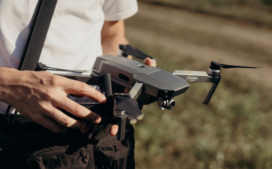 Person holding dji mavic drone