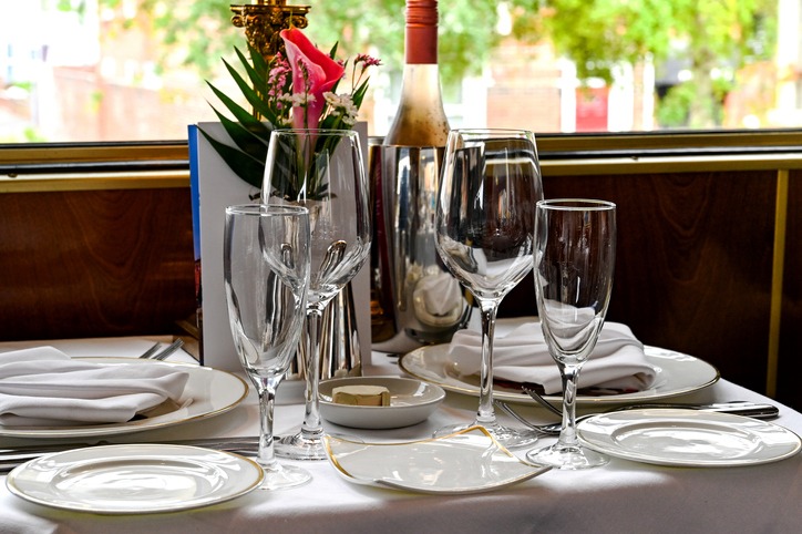 Formal dinner setting on a luxury train