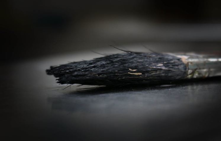 A paint brush on a surface