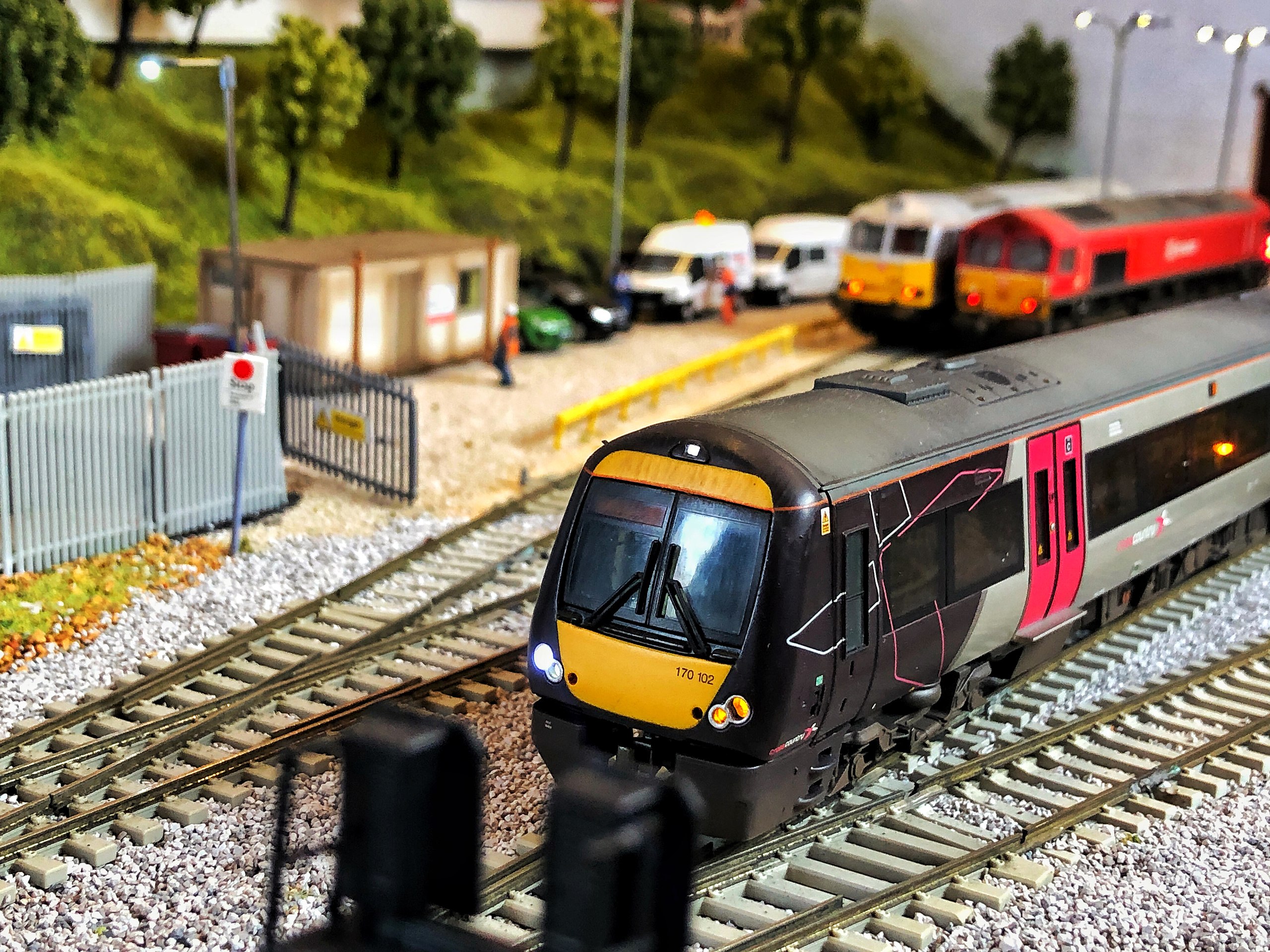 A Bachmann Branchline Class 170 DMU in Cross Country livery is seen on the fictitious model railway "Ackworth Parkway"
