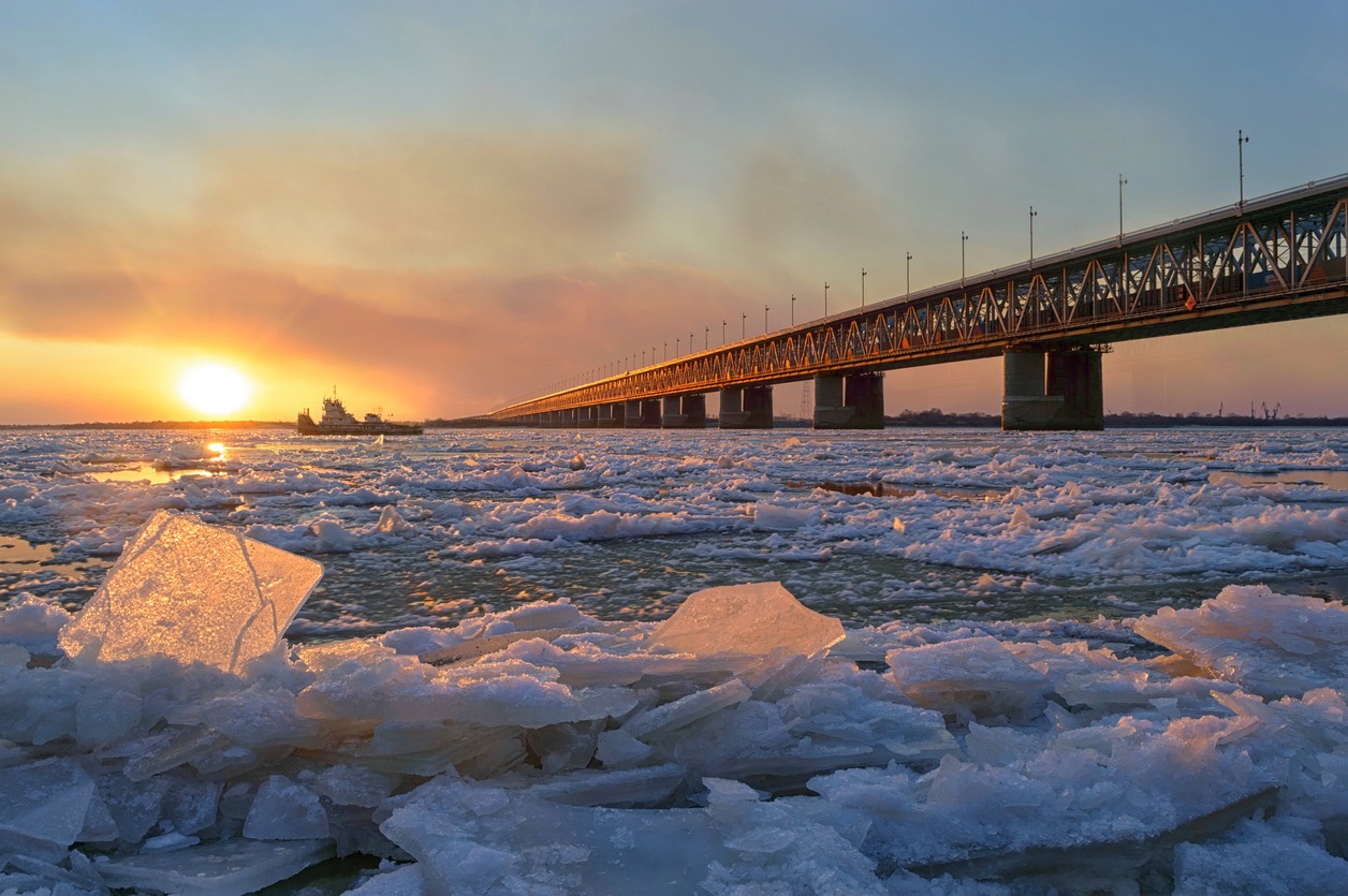 Ice drift on the Amur river. Amur bridge, Trans siberian railway. Khabarovsk, far East, Russia