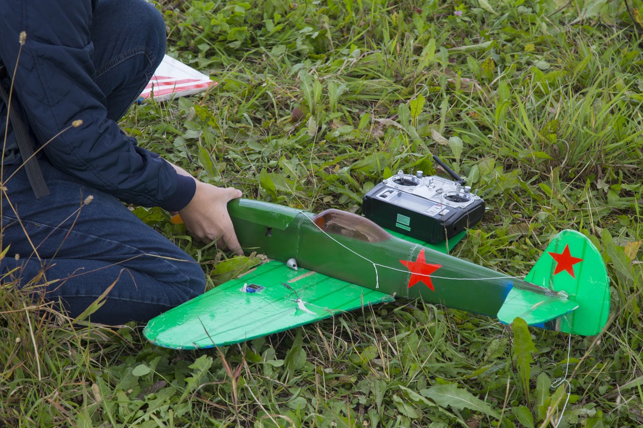 Radio controlled aircraft being prepared for flight
