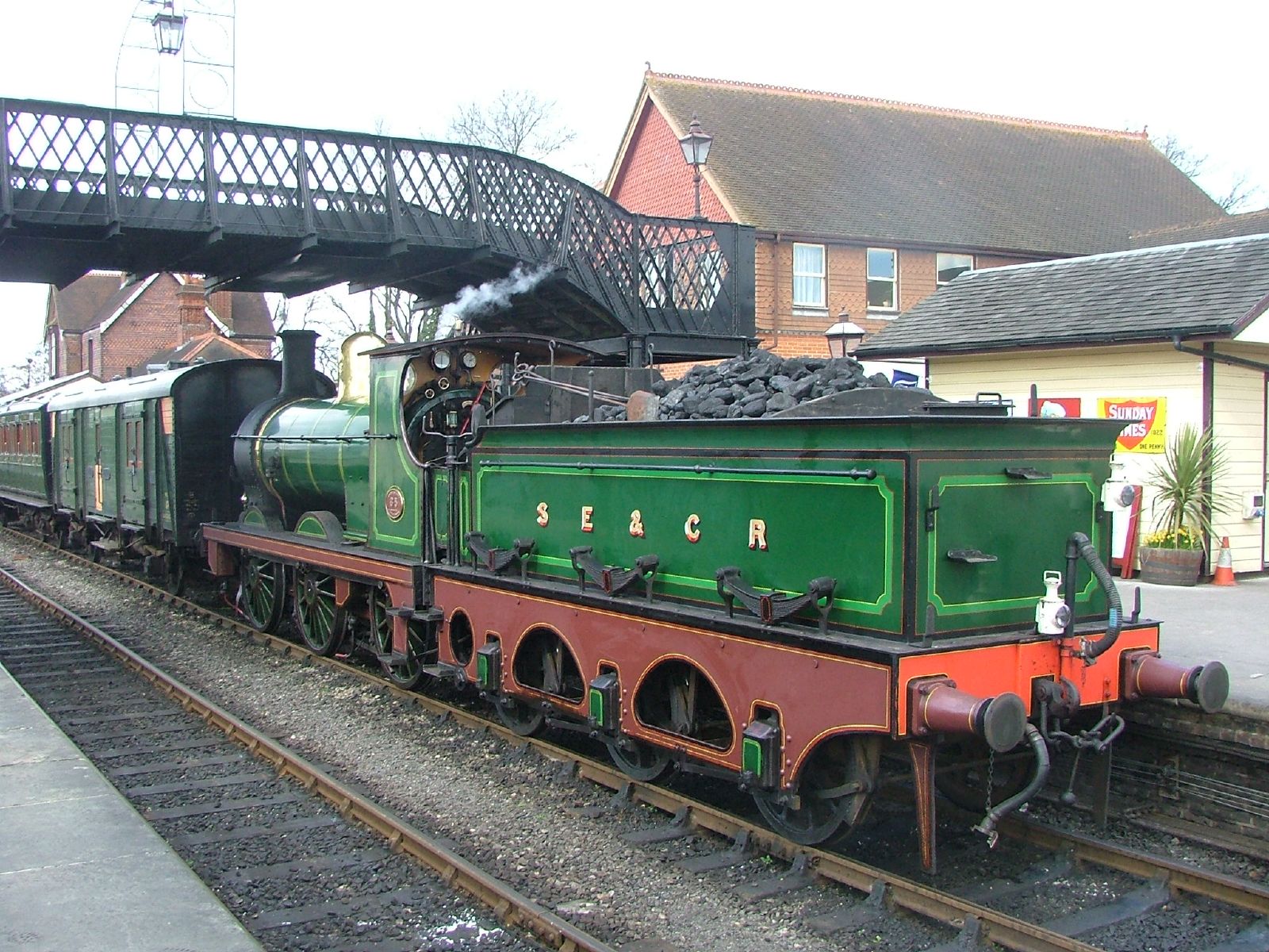 A British SECR O1 class runs tender-first at the Bluebell Railway