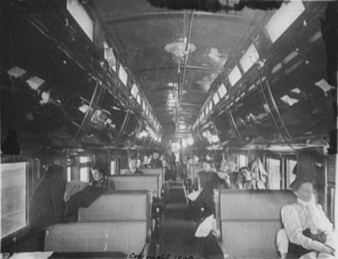 Interior of a Pullman car on the Chicago and Alton Railroad, c. 1900, configured for daytime operation