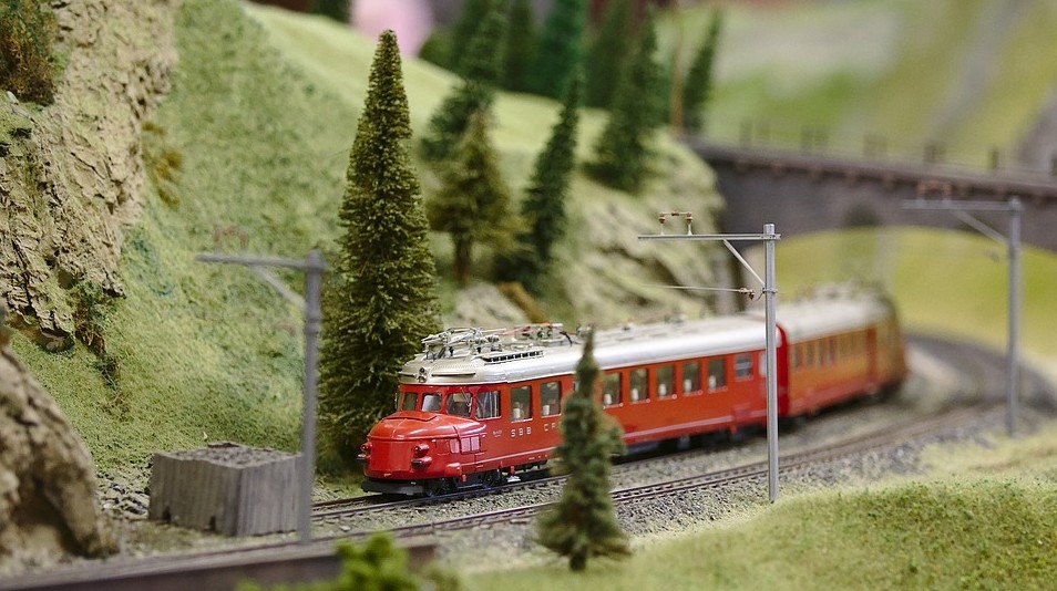 model train running in a landscape