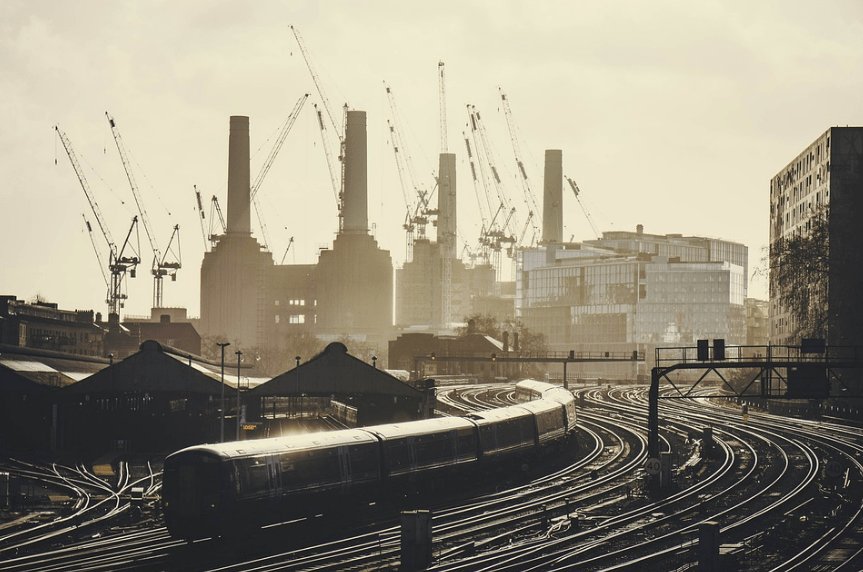 a train passing by a city